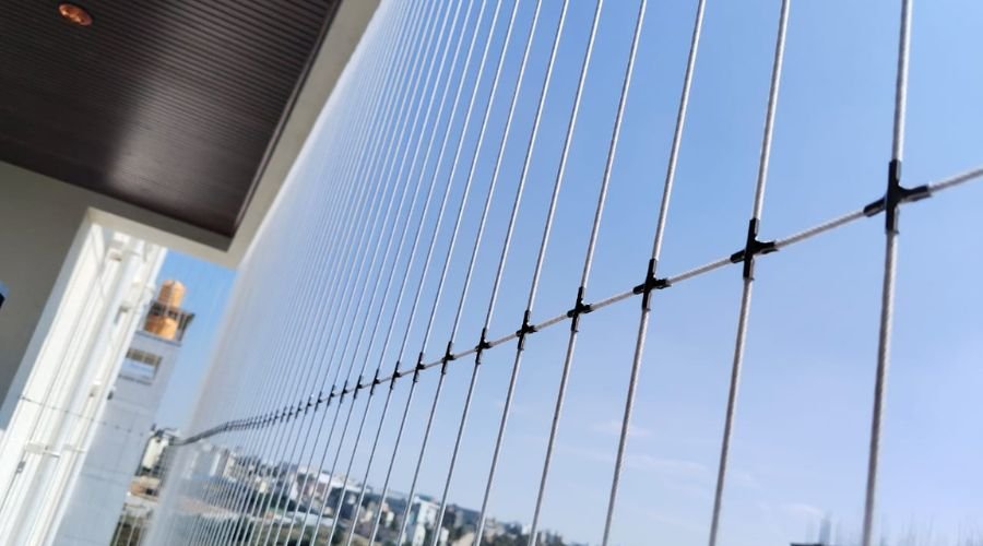 Stainless steel invisible grills providing clear balcony view with safety